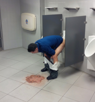 Illustration for article titled World's Saddest Nets Fan Shits Into Urinal While Vomiting (NSFW)